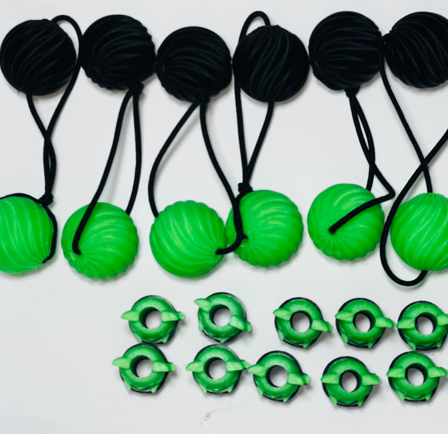 glow sm. Delightful swirl drop 3-D ponytail holders with matching beadettes.