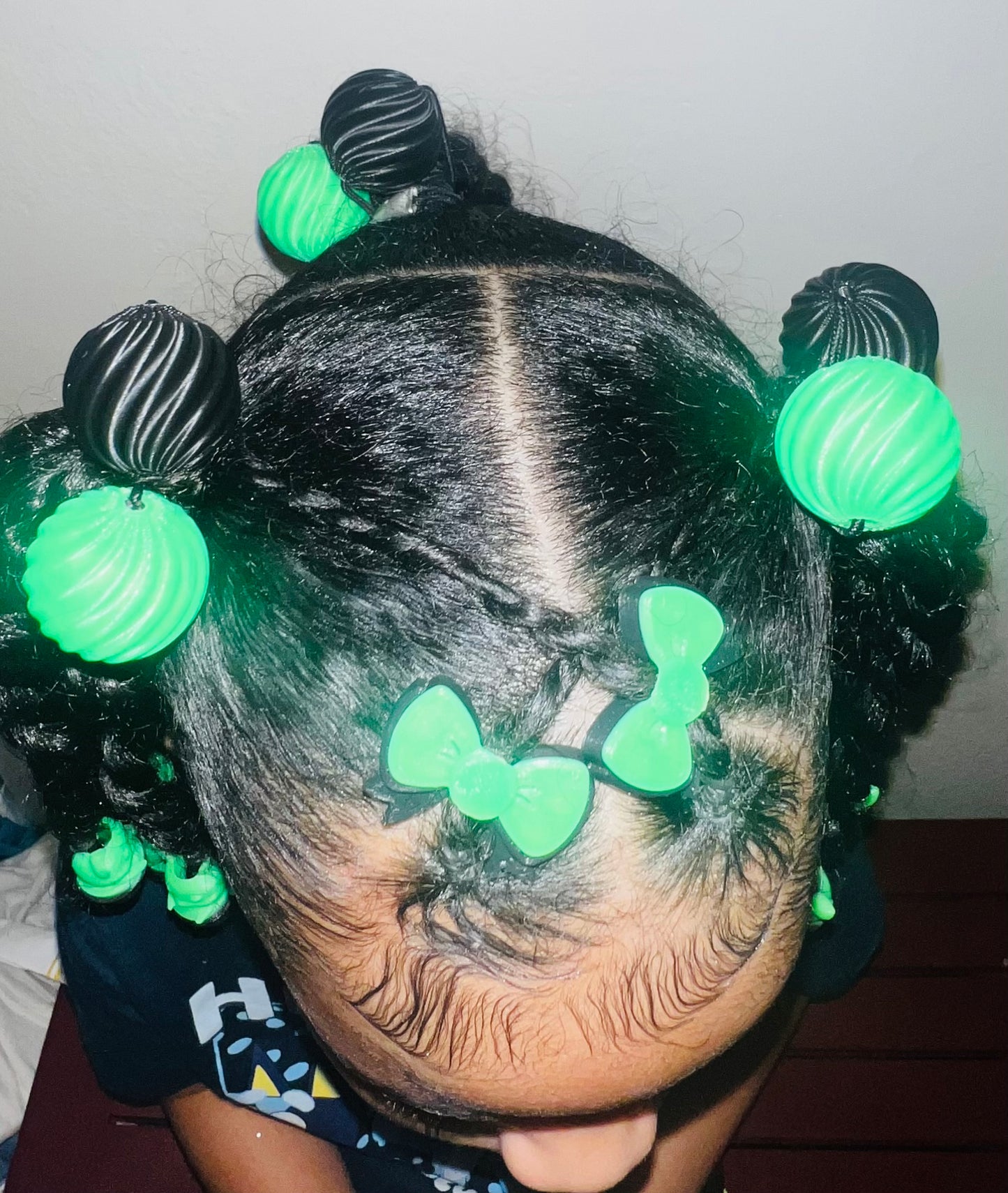 glow sm. Delightful swirl drop 3-D ponytail holders with matching beadettes.